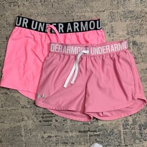 Under Armour Girl’s shorts 2 pairs, light pink and neon pink size in medium